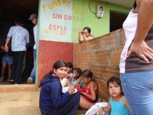 Children displaced or fatherless by FARC violence get fed at a Medellin Colombia soup kitchen